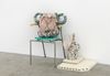 Pots, 2016. Glazed stoneware, egg tempera, concrete, foam cushion, oven plates, book and chair. 84 x 100 x 50 cm 
