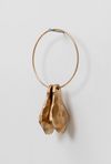 Sidsel Meineche Hansen. Scrotum Bell, 2022. Crotal bells (pair), hollow cast in bronze with pebble inside. 27,5 x 14,5 x 6 cm